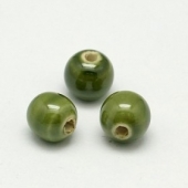 Bolas de ceramica 10mm color verde. Agujero 2mm