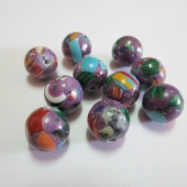 Bola turquesa sinttica 10mm. Pase 1mm. (mosaico lila)