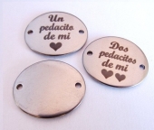 PERSONALIZADO. Conector acero inoxidable pequeo 24x18mm. Agujero 1,5mm.  Plazo 2-4 das