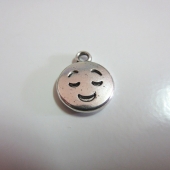 Colgante metalico emoticono  plata vieja. 15x11mm. mod.3