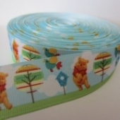 Cinta grosgrain estampado winnie 25mm. (Precio por metro)