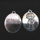 PERSONALIZABLE. Medalla comunin nio  metal  25x18mm. Mi primera comunin plata vieja