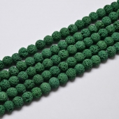 63 unidades. Abalorio lava porosa bola 6mm. Agujero 1mm. verde oscuro