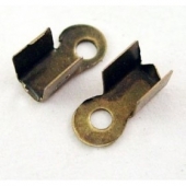 100 unidades. Chafa 9x5mm bronce antiguo.Para cuero de 3mm