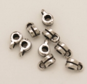 Abalorio zamak pasador 7x4,5mm. Anilla 2mm. Pase 3mm. Bao de plata